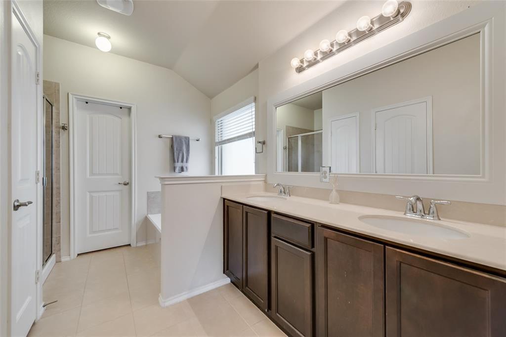 3406 Van Zandt Road Melissa, TX 75454 - Photo 5 of 6 a bathroom with a double vanity sink and mirror