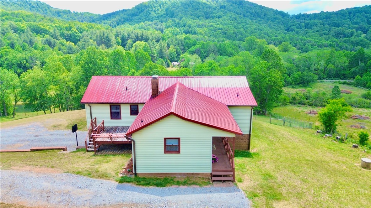 1315 Irwin Grocery Road Laurel Springs, NC 28644 - Photo 2 of 22 an aerial view of a house
