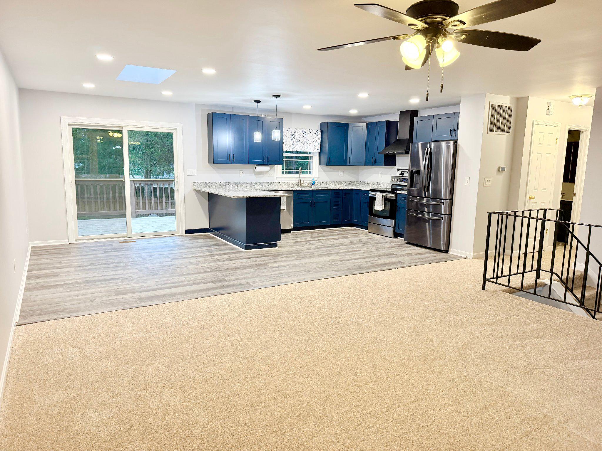 2175 Sebastian Road Fredericksburg, VA 22405 - Photo 14 of 37 Open-concept living space with skylight.