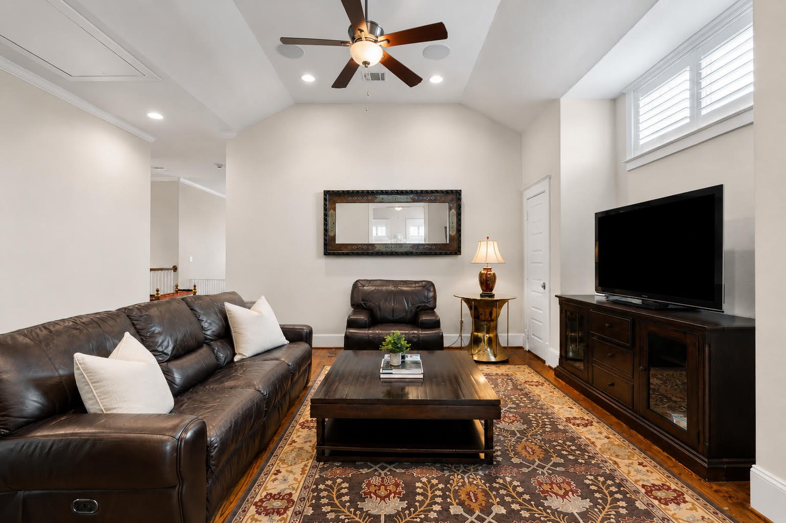 1217 Chippendale Road Houston, TX 77018 - Photo 28 of 42 Spacious 2nd floor gameroom offers 11' ceilings, hardwood flooring, recessed lighting, ceiling fan w/ light, & built-in ceiling speakers. Generous proportions provide ample room for multiple seating, game, or entertainment areas, creating an ideal destination for family & guests.