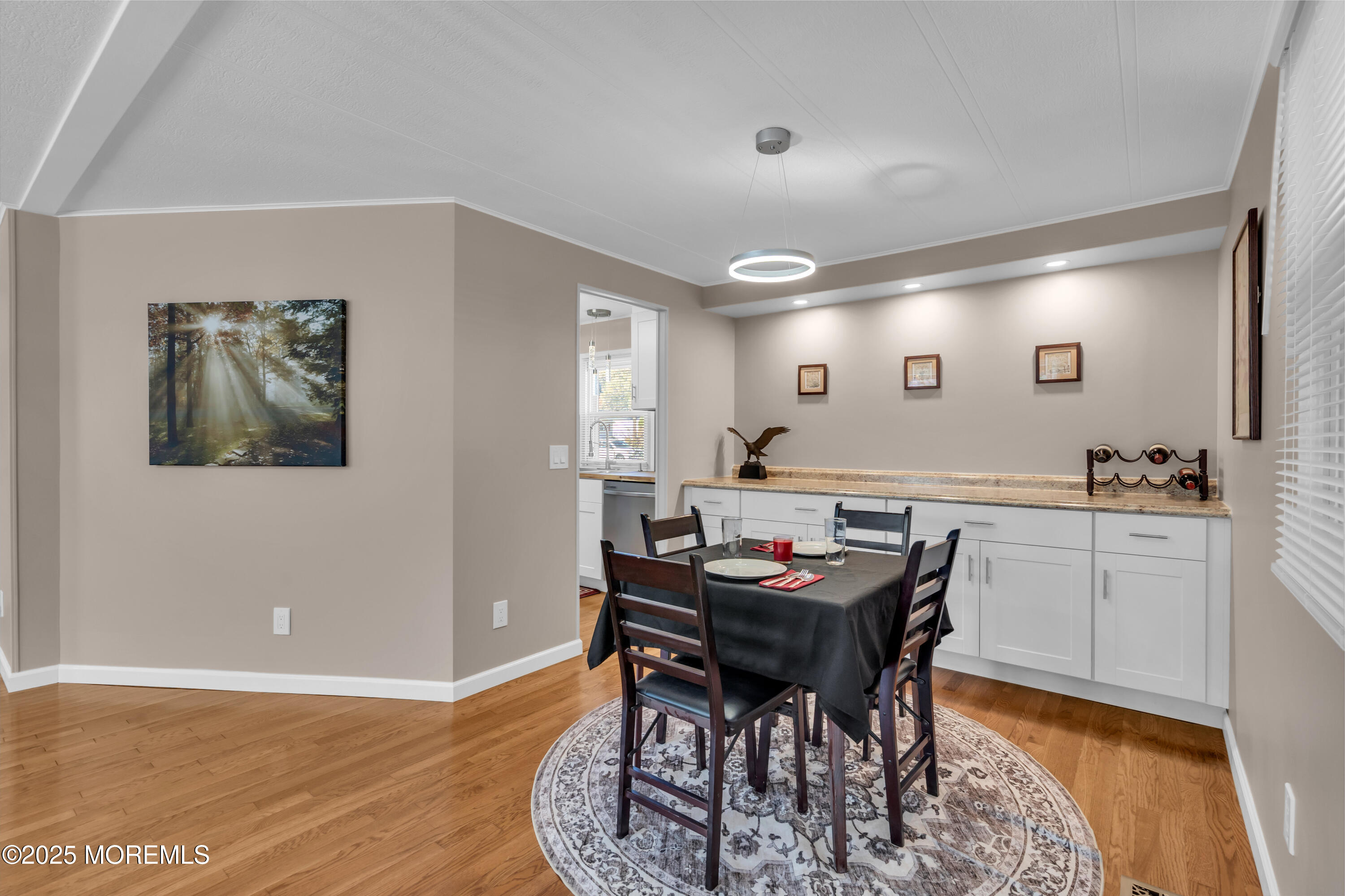 166 Mockingbird Way Whiting, NJ 08759 - Photo 11 of 28 a view of a kitchen with a table and chairs