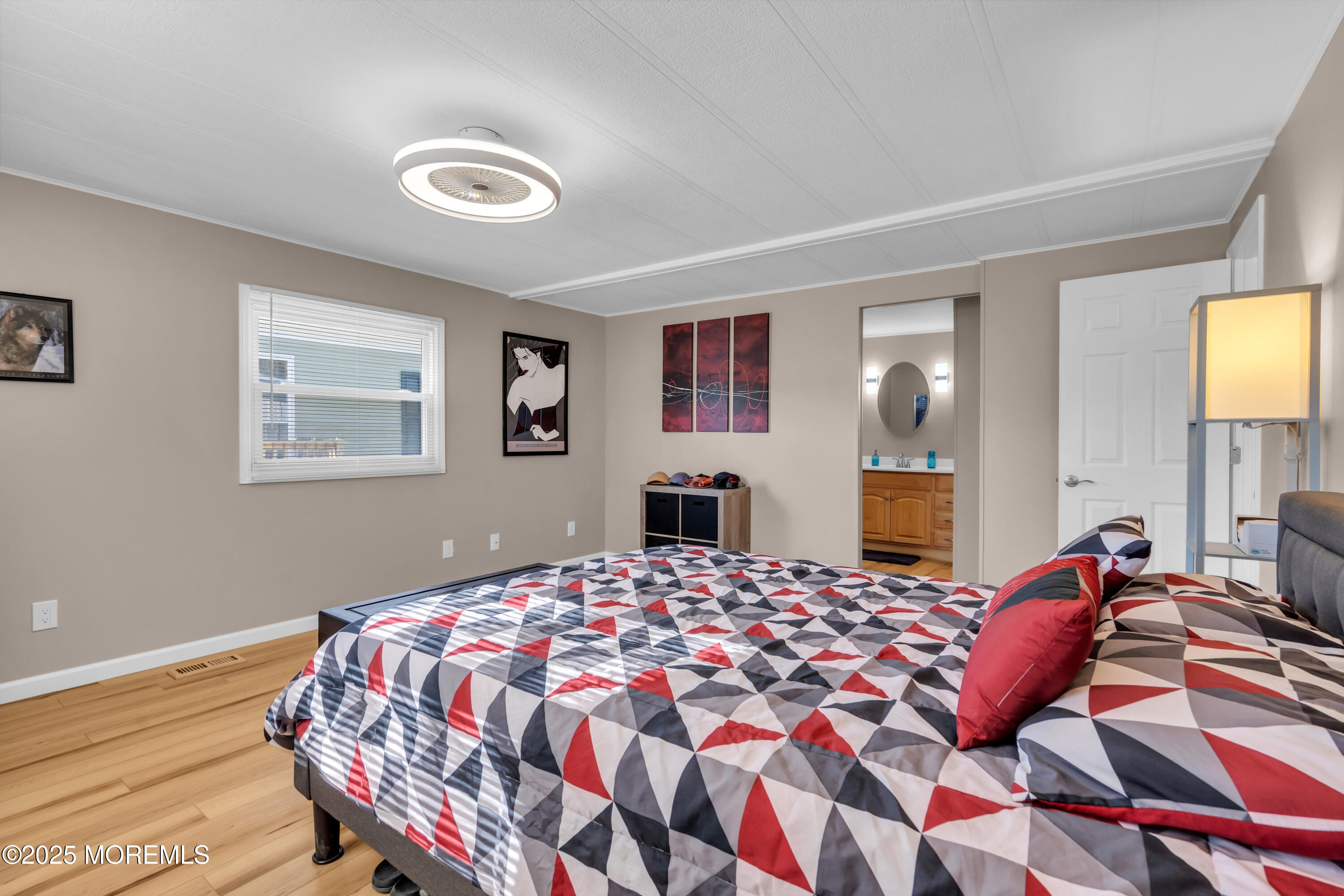 166 Mockingbird Way Whiting, NJ 08759 - Photo 20 of 28 a bedroom with a bed and a view of kitchen