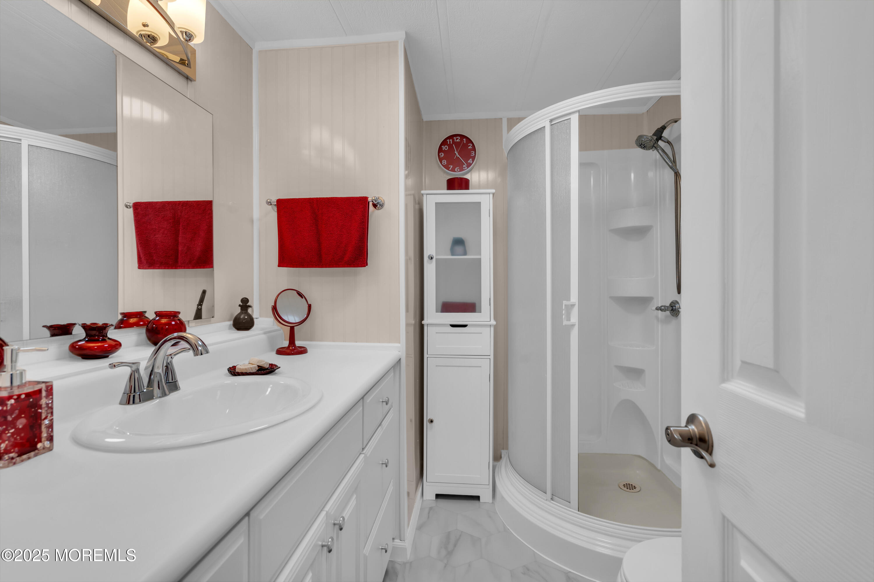 166 Mockingbird Way Whiting, NJ 08759 - Photo 24 of 28 a bathroom with a sink vanity tub and shower