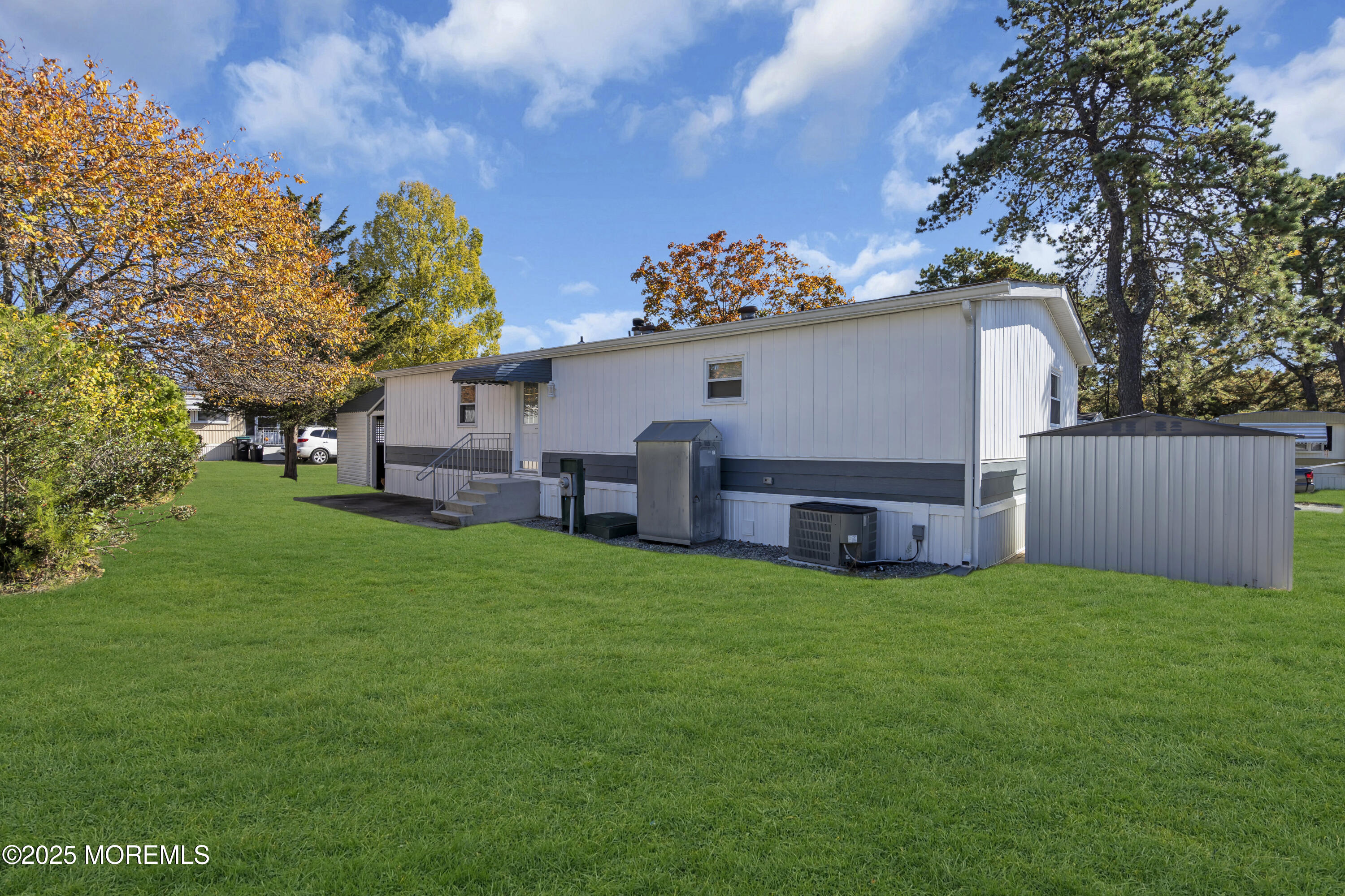 166 Mockingbird Way Whiting, NJ 08759 - Photo 25 of 28 a view of a house with a backyard