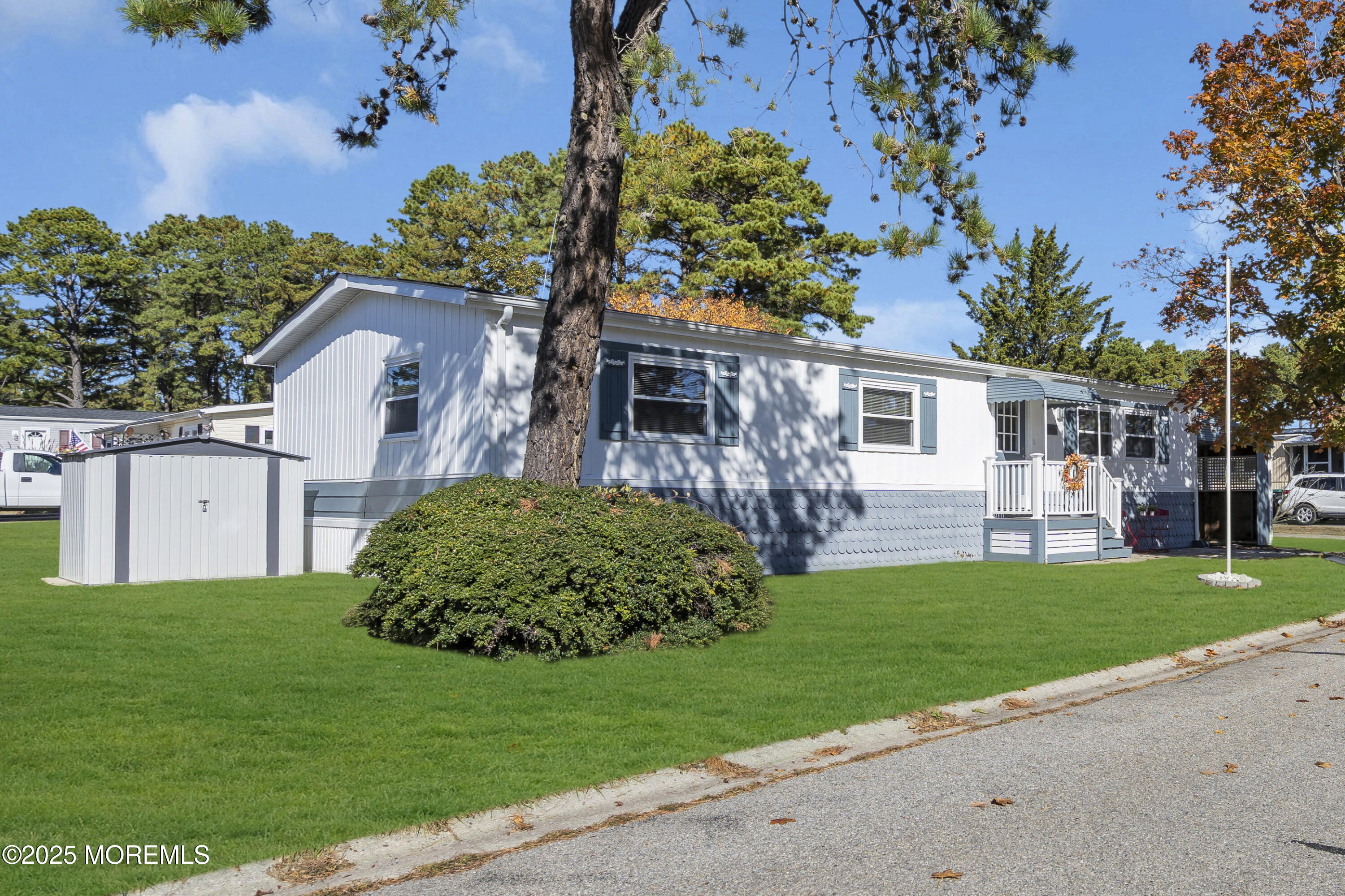 166 Mockingbird Way Whiting, NJ 08759 - Photo 3 of 28 a front view of a house with a garden