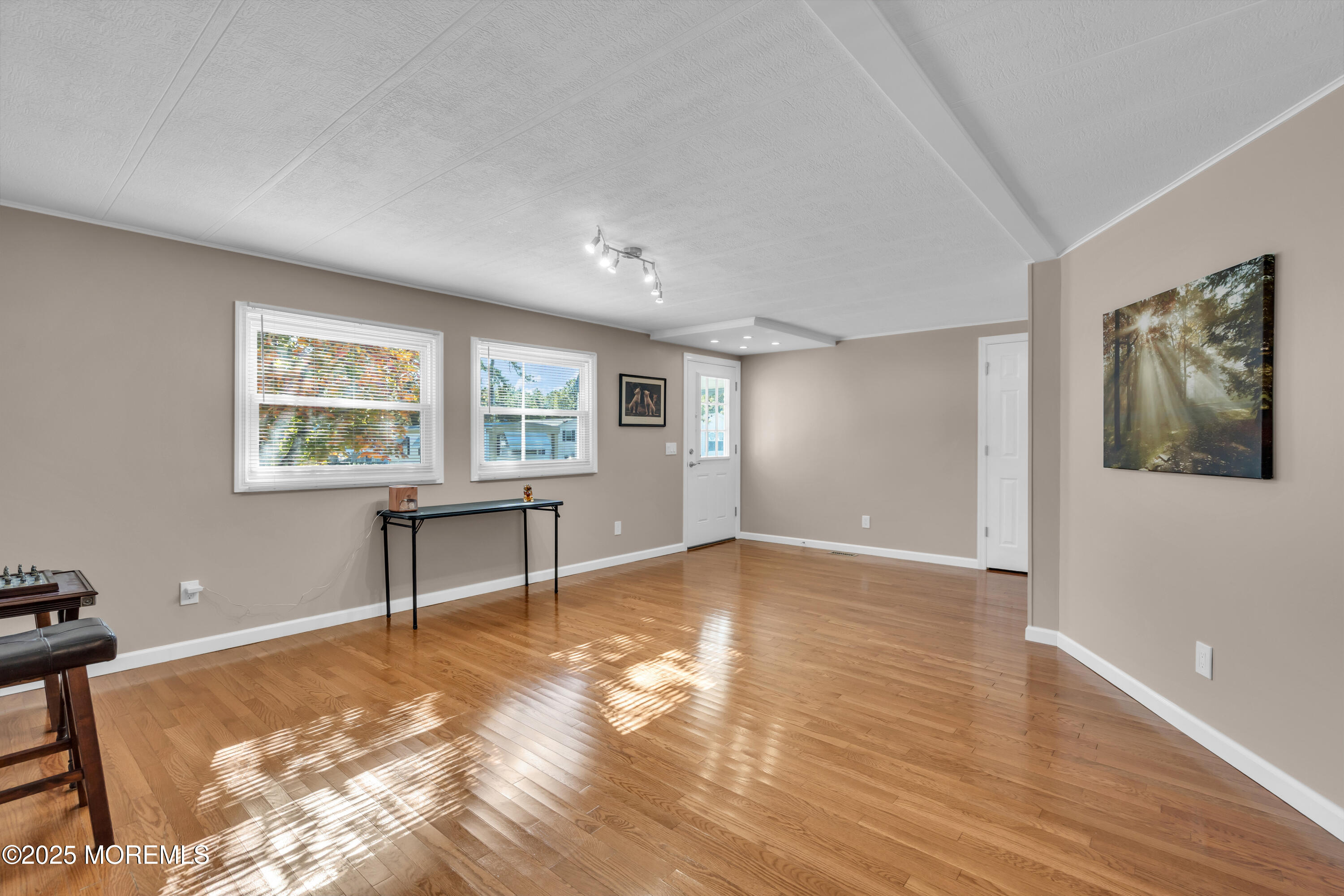 166 Mockingbird Way Whiting, NJ 08759 - Photo 6 of 28 a view of an empty room with a window