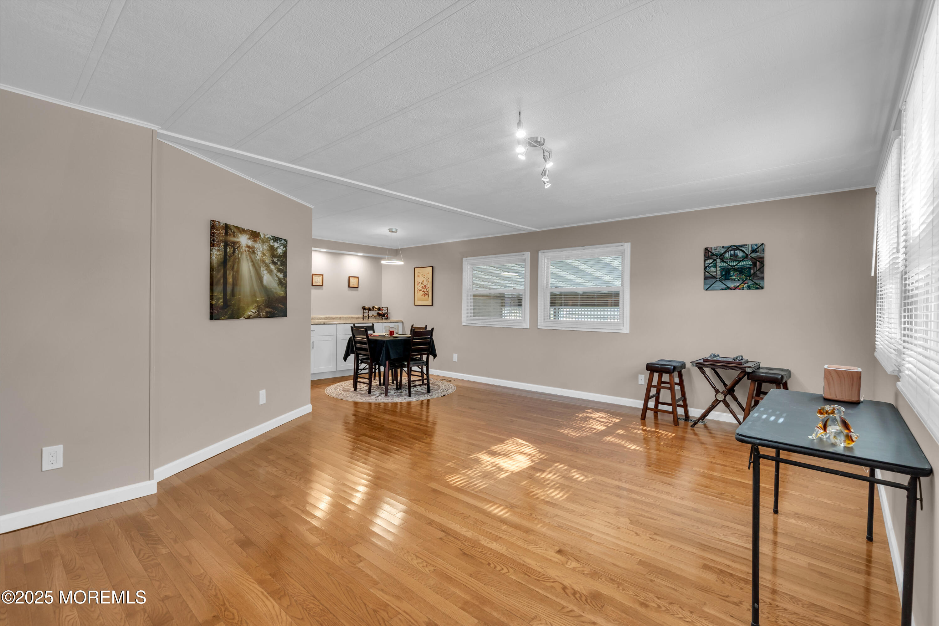 166 Mockingbird Way Whiting, NJ 08759 - Photo 7 of 28 a living room with furniture and a table with wooden floor