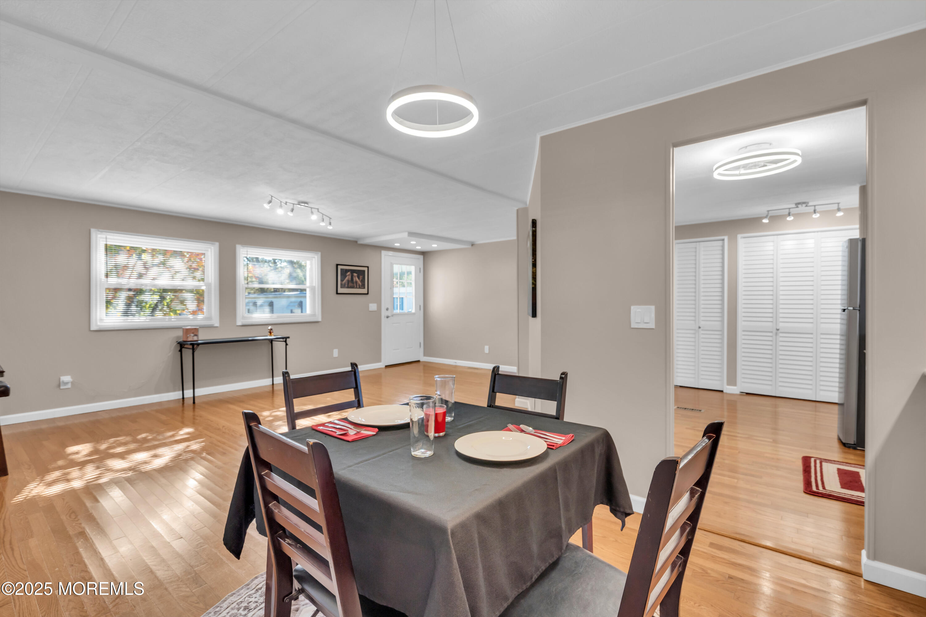 166 Mockingbird Way Whiting, NJ 08759 - Photo 9 of 28 a view of a dining room with furniture and wooden floor
