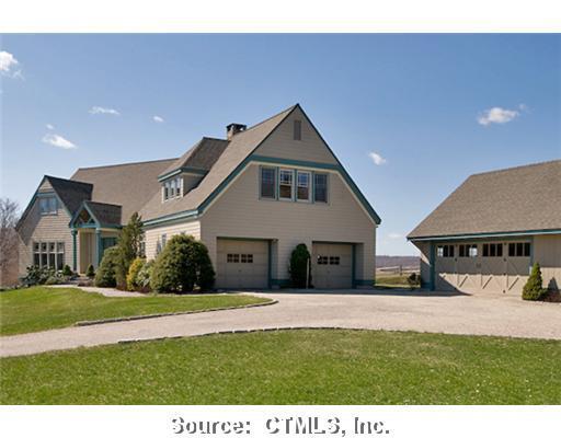 27 Strickland Road Middlefield, CT 06455 - Photo 1 of 1 a front view of a house with a yard