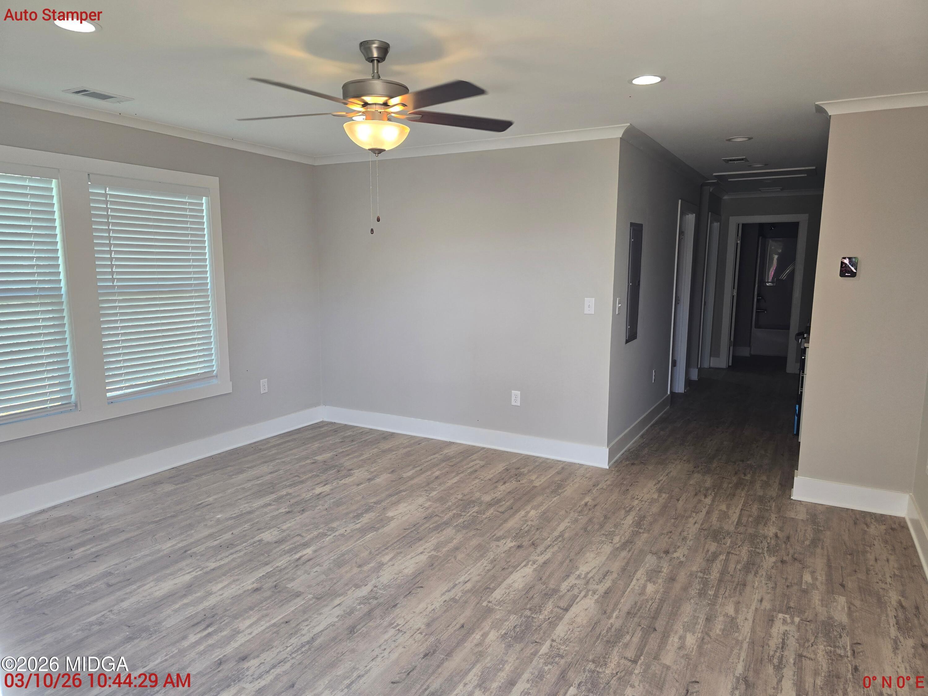 3896 Davis Road Macon, GA 31217 - Photo 3 of 12 wooden floor in an empty room with a window