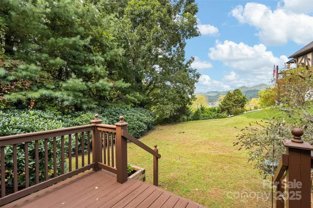 a view of a balcony with ocean view