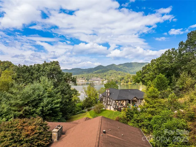 a view of a lake with a building in the background