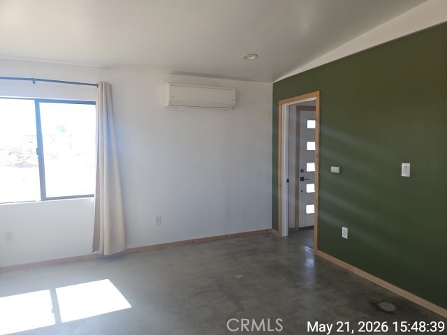 65154 Hoover Aka Mars St Road Joshua Tree, CA 92252 - Photo 6 of 11 a view of an empty room with a window