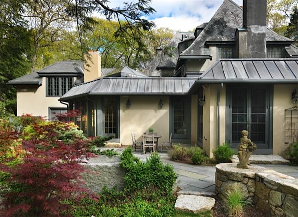 2 Willow Road Weston, MA 02493 - Photo 17 of 21 a front view of a house with garden