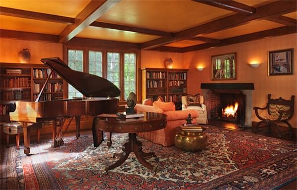 2 Willow Road Weston, MA 02493 - Photo 5 of 21 a living room with furniture a fireplace and a dining table with wooden floor