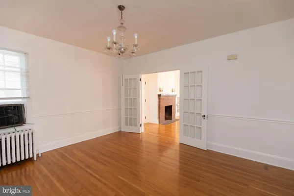 a view of a livingroom with wooden floor