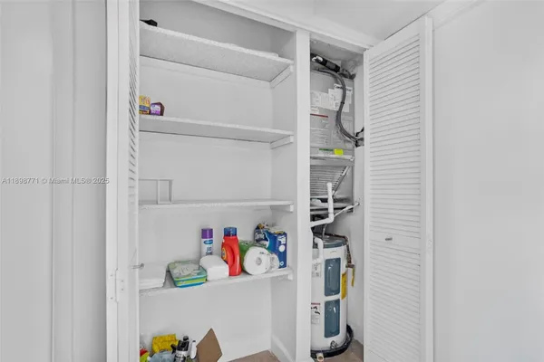 a view of storage and utility room with shelves