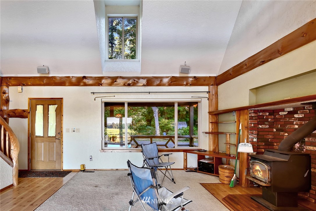 2587 Birch Bay Lynden Road Custer, WA 98240 - Photo 11 of 39 a living room with fireplace furniture and a window