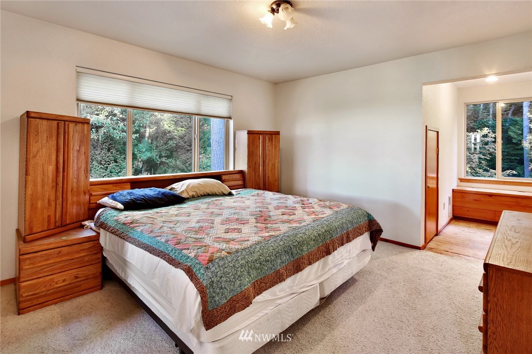 2587 Birch Bay Lynden Road Custer, WA 98240 - Photo 24 of 39 a bed sitting in a spacious bedroom next to a window