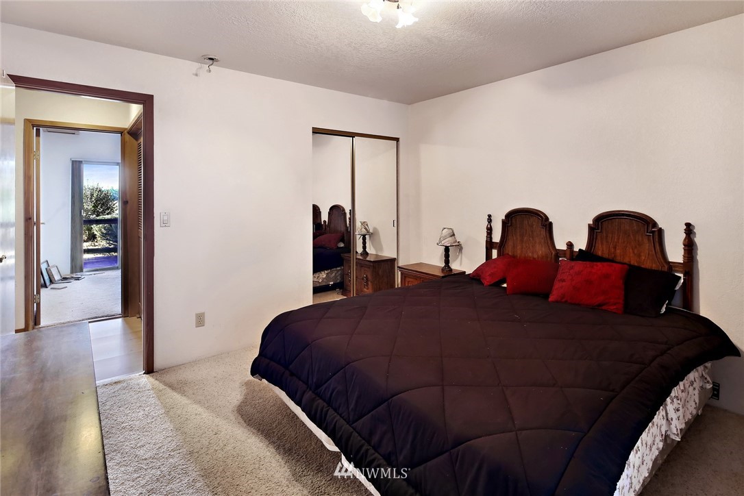2587 Birch Bay Lynden Road Custer, WA 98240 - Photo 31 of 39 a bedroom with a bed and closet