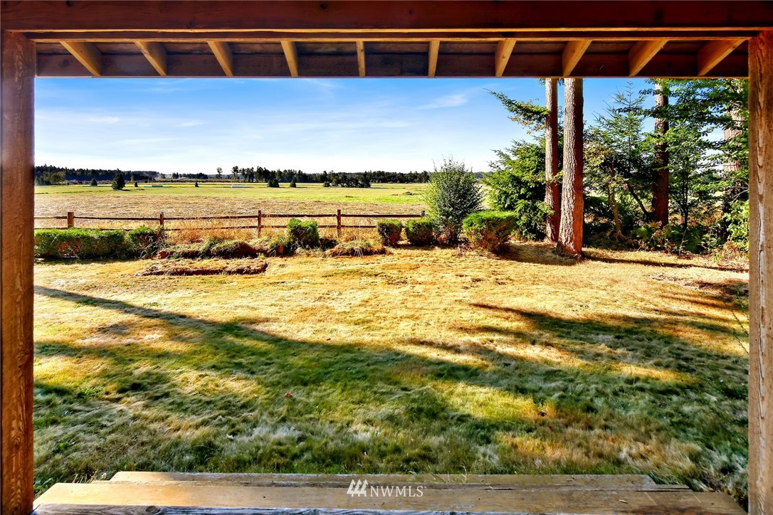 2587 Birch Bay Lynden Road Custer, WA 98240 - Photo 35 of 39 a view of a swimming pool with an outdoor seating and a yard