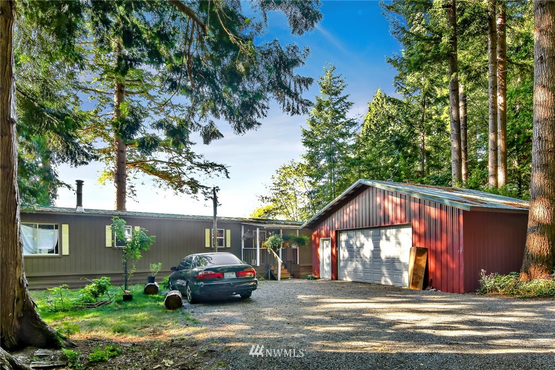 2587 Birch Bay Lynden Road Custer, WA 98240 - Photo 39 of 39 a front view of a house with a garden