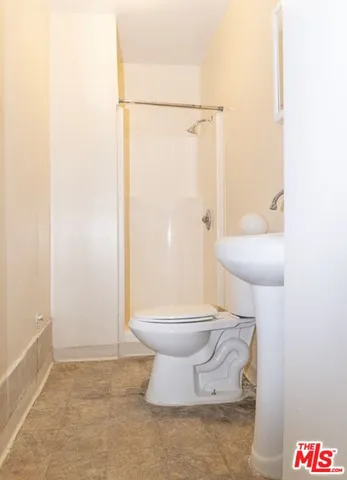 a view of a chairs and table in the patio