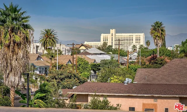 a view of street with sitting area