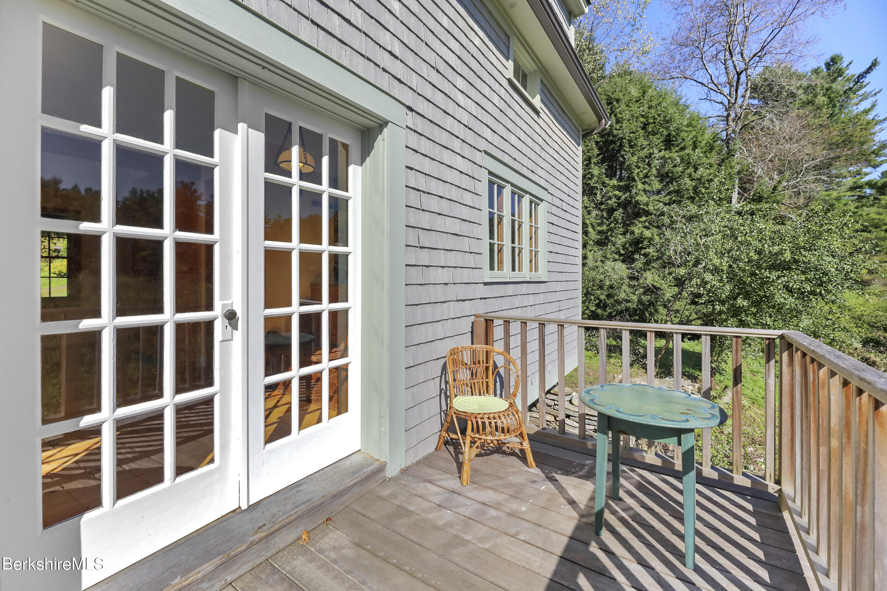 56 Brett Road Monterey, MA 01245 - Photo 13 of 22 a view of a chairs in a balcony