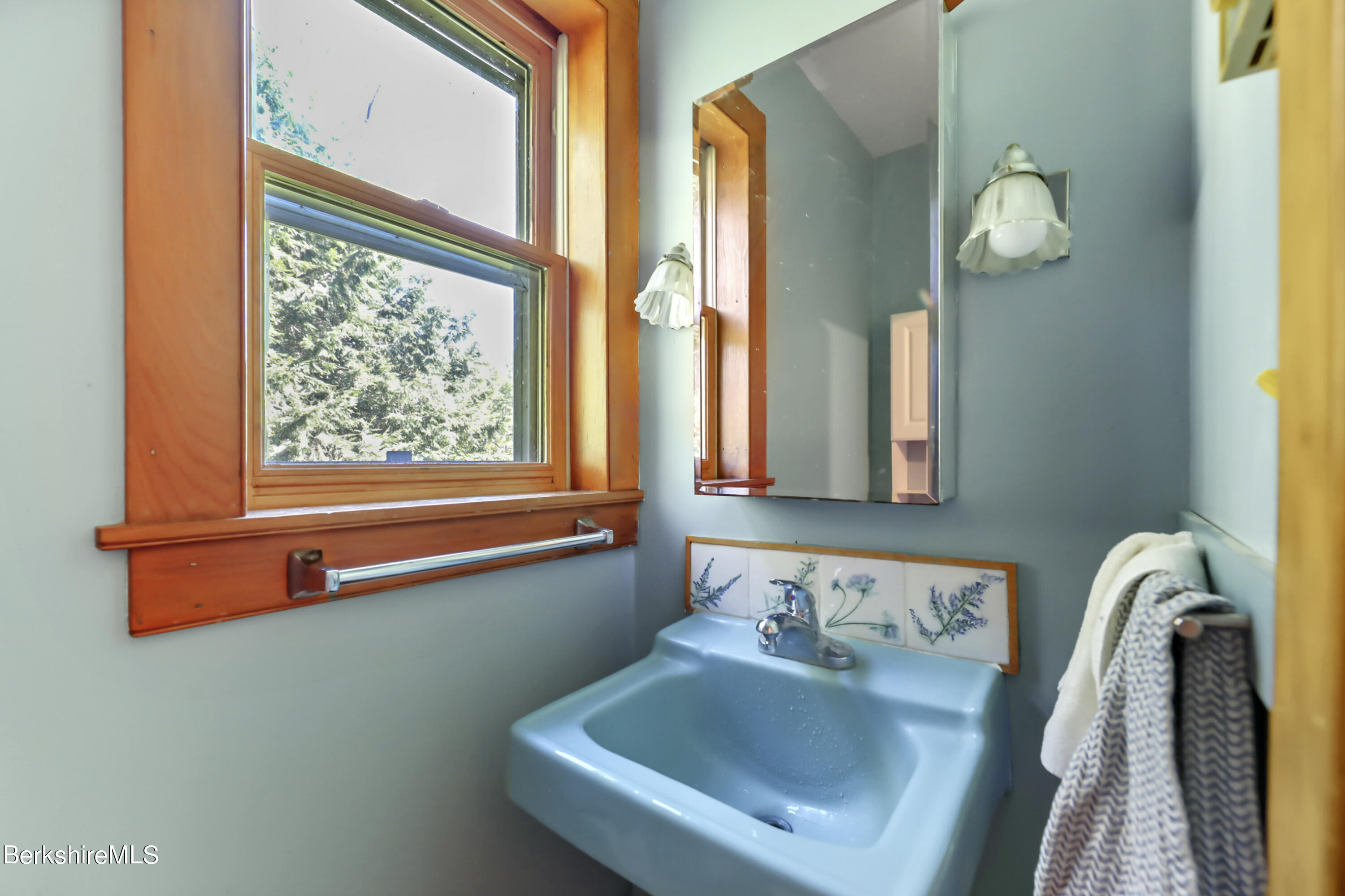 56 Brett Road Monterey, MA 01245 - Photo 14 of 22 a bathroom with a sink and a mirror