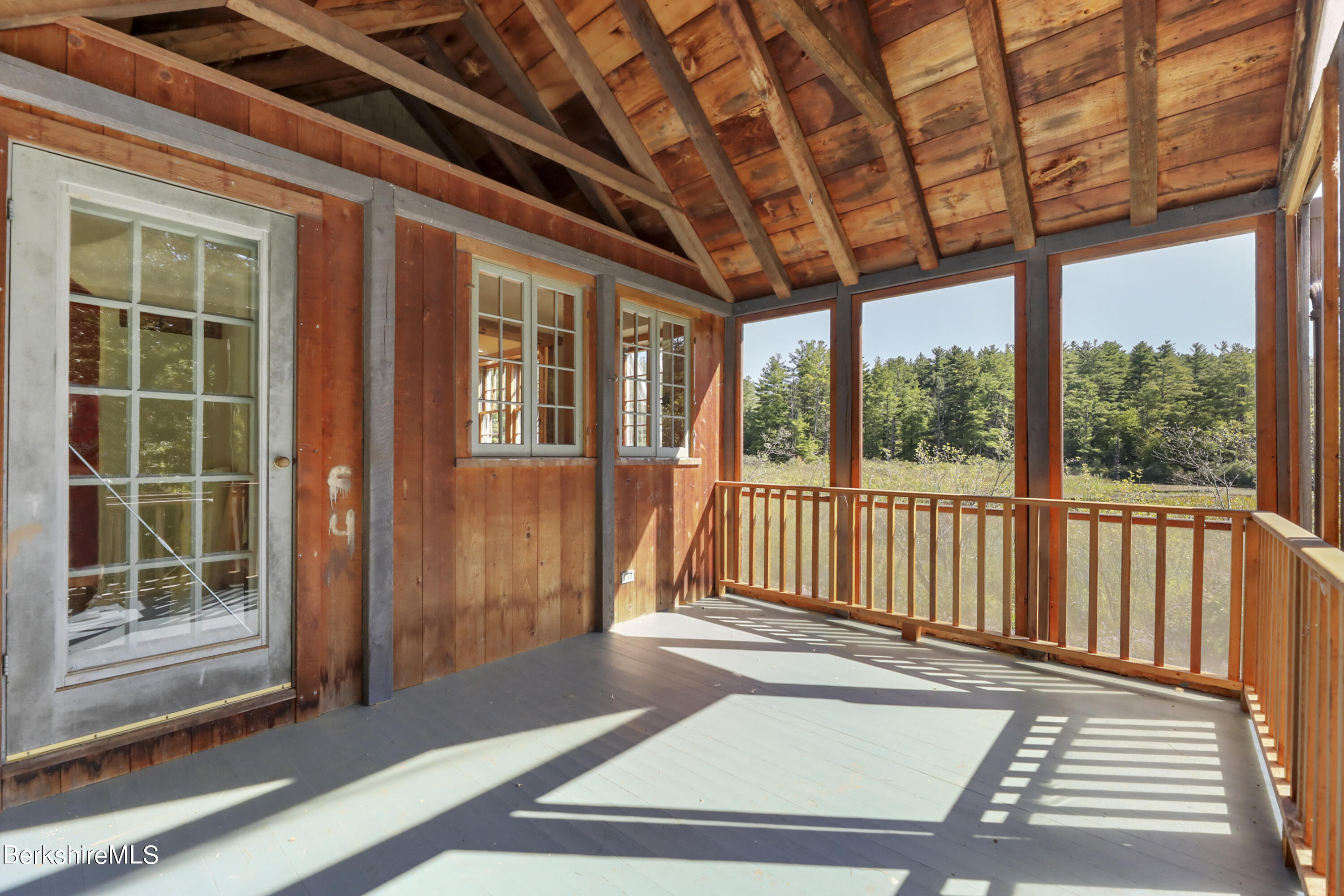 56 Brett Road Monterey, MA 01245 - Photo 15 of 22 a view of porch with a black gate