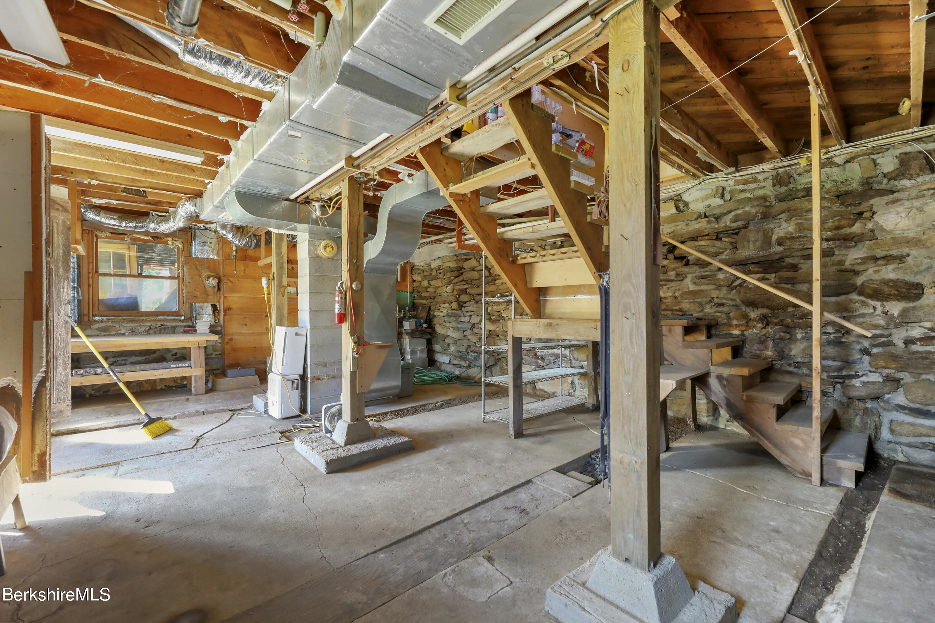 56 Brett Road Monterey, MA 01245 - Photo 18 of 22 a view of a room with wooden floor