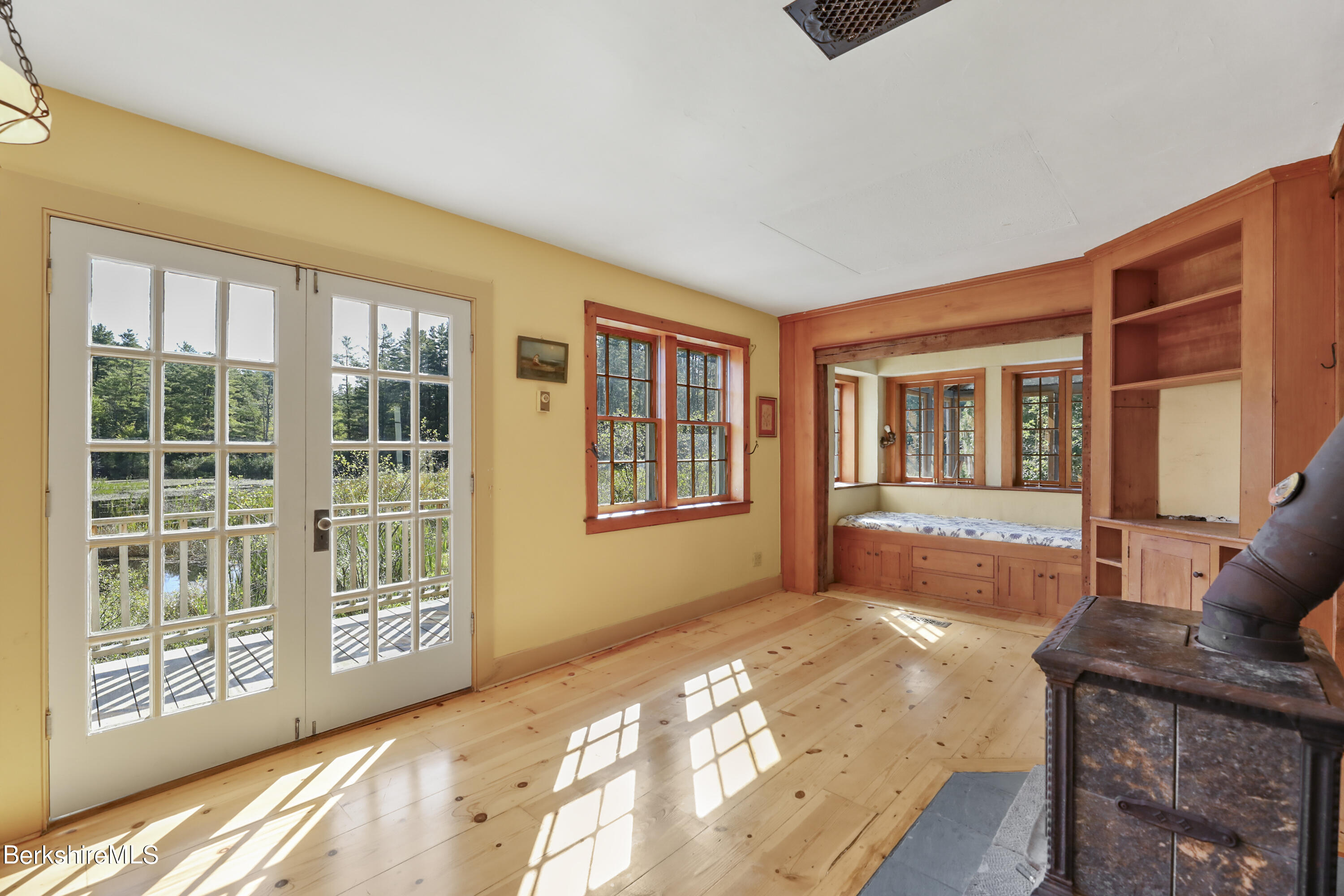 56 Brett Road Monterey, MA 01245 - Photo 8 of 22 a view of an house with wooden floor and windows