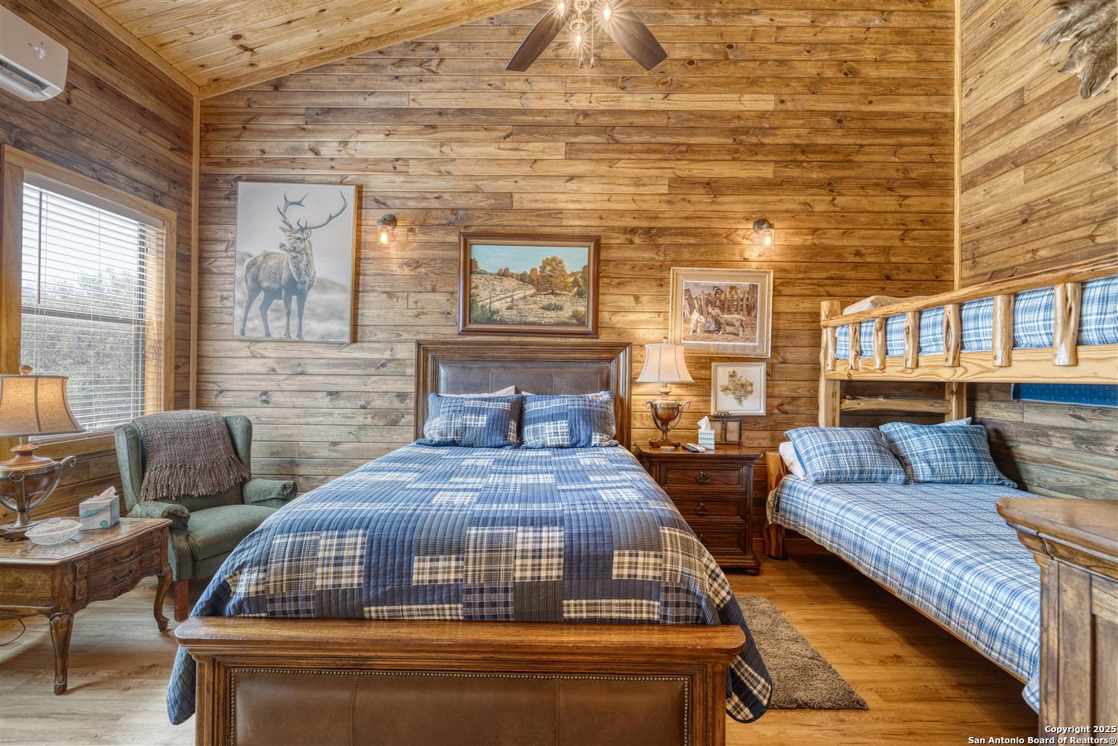2242 Patterson Creek Road Leakey, TX 78873 - Photo 25 of 57 a living room with furniture and a fireplace