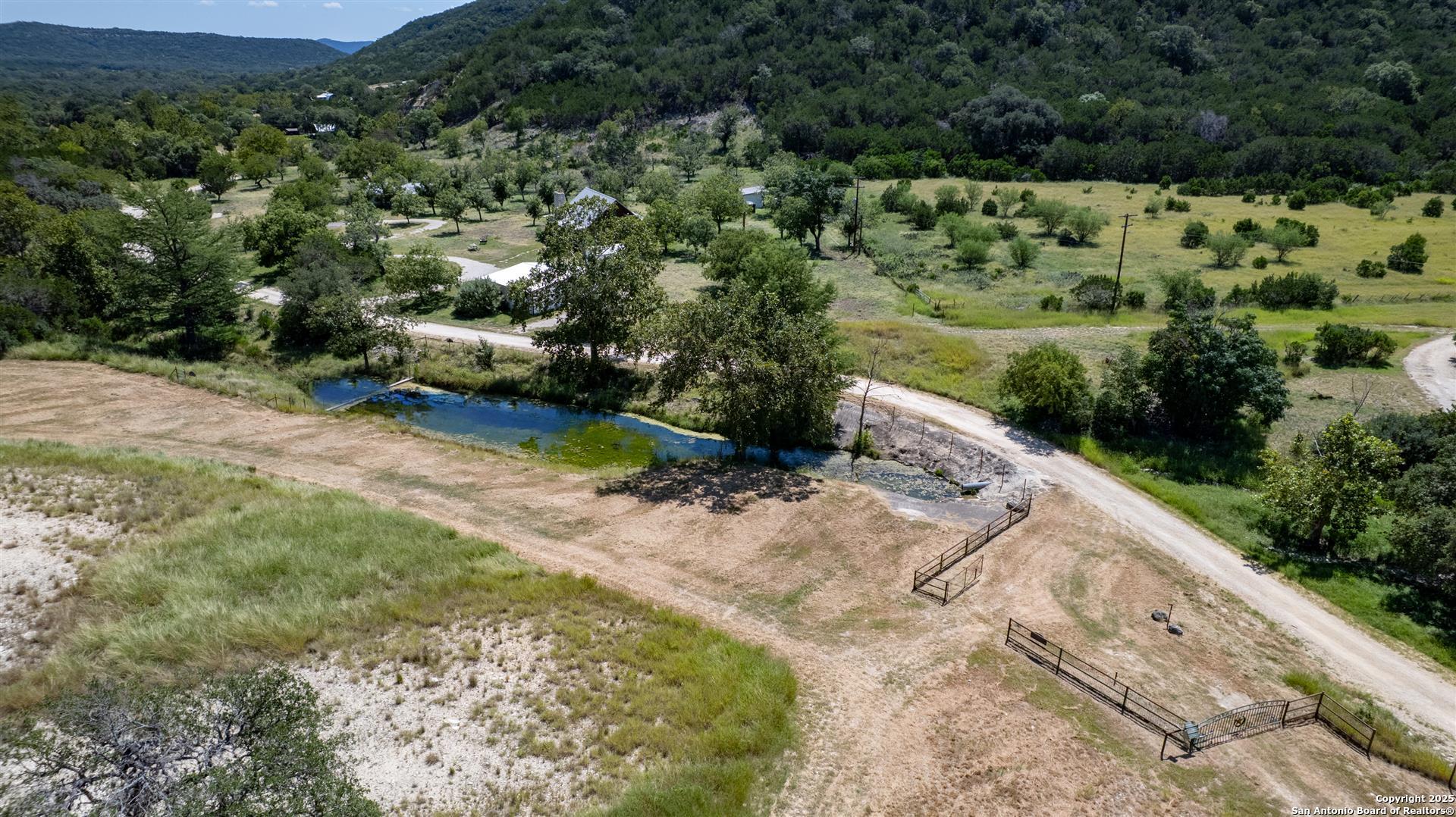 2242 Patterson Creek Road Leakey, TX 78873 - Photo 3 of 57 a view of a road with a yard