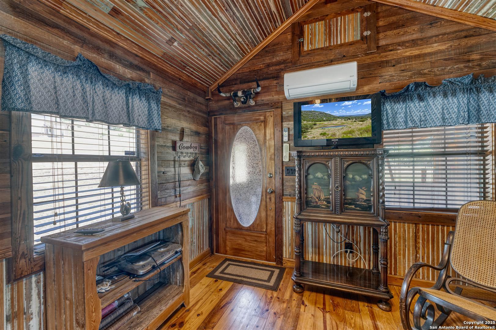 2242 Patterson Creek Road Leakey, TX 78873 - Photo 36 of 57 a view of living room with furniture and a fireplace