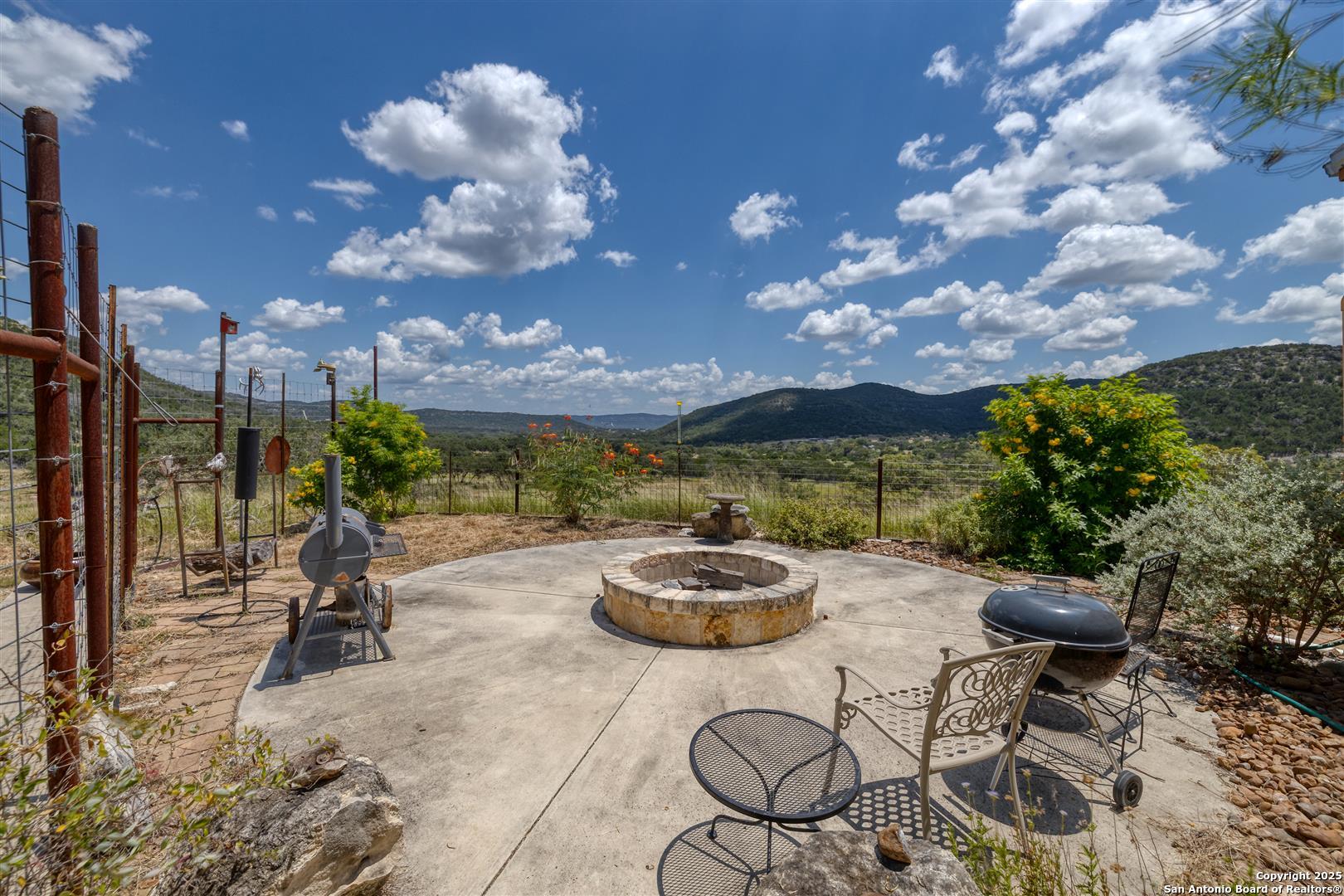 2242 Patterson Creek Road Leakey, TX 78873 - Photo 40 of 57 a table and chairs in a patio