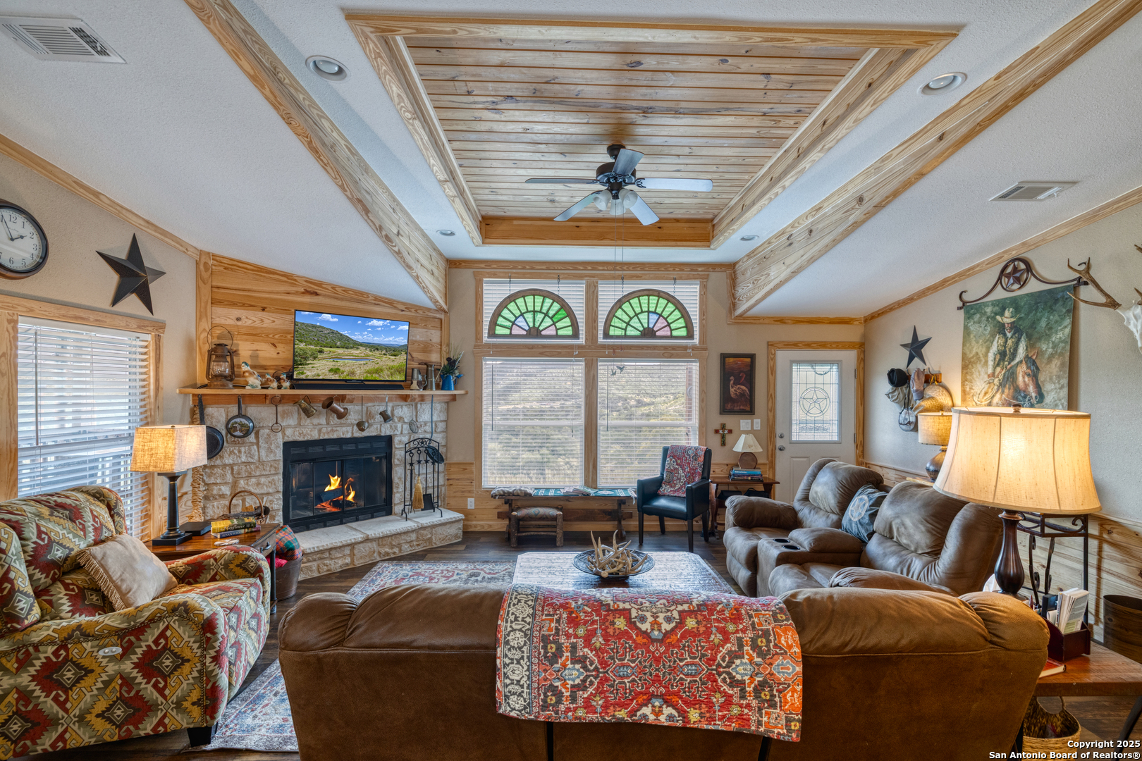 2242 Patterson Creek Road Leakey, TX 78873 - Photo 46 of 57 a living room with furniture fireplace and a large window