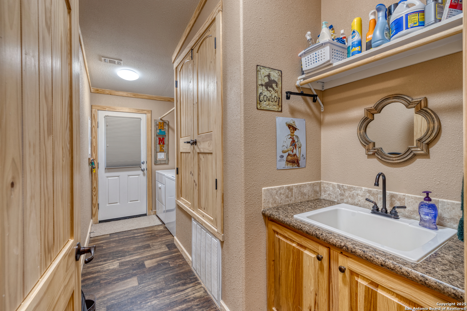 2242 Patterson Creek Road Leakey, TX 78873 - Photo 49 of 57 a bathroom with a sink and a mirror
