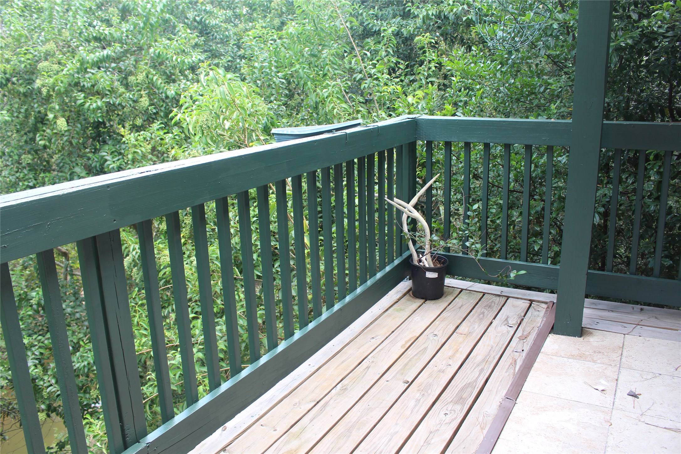 8277 Kingsbrook Road, Unit 255 Houston, TX 77024 - Photo 3 of 27 a view of balcony with wooden floor