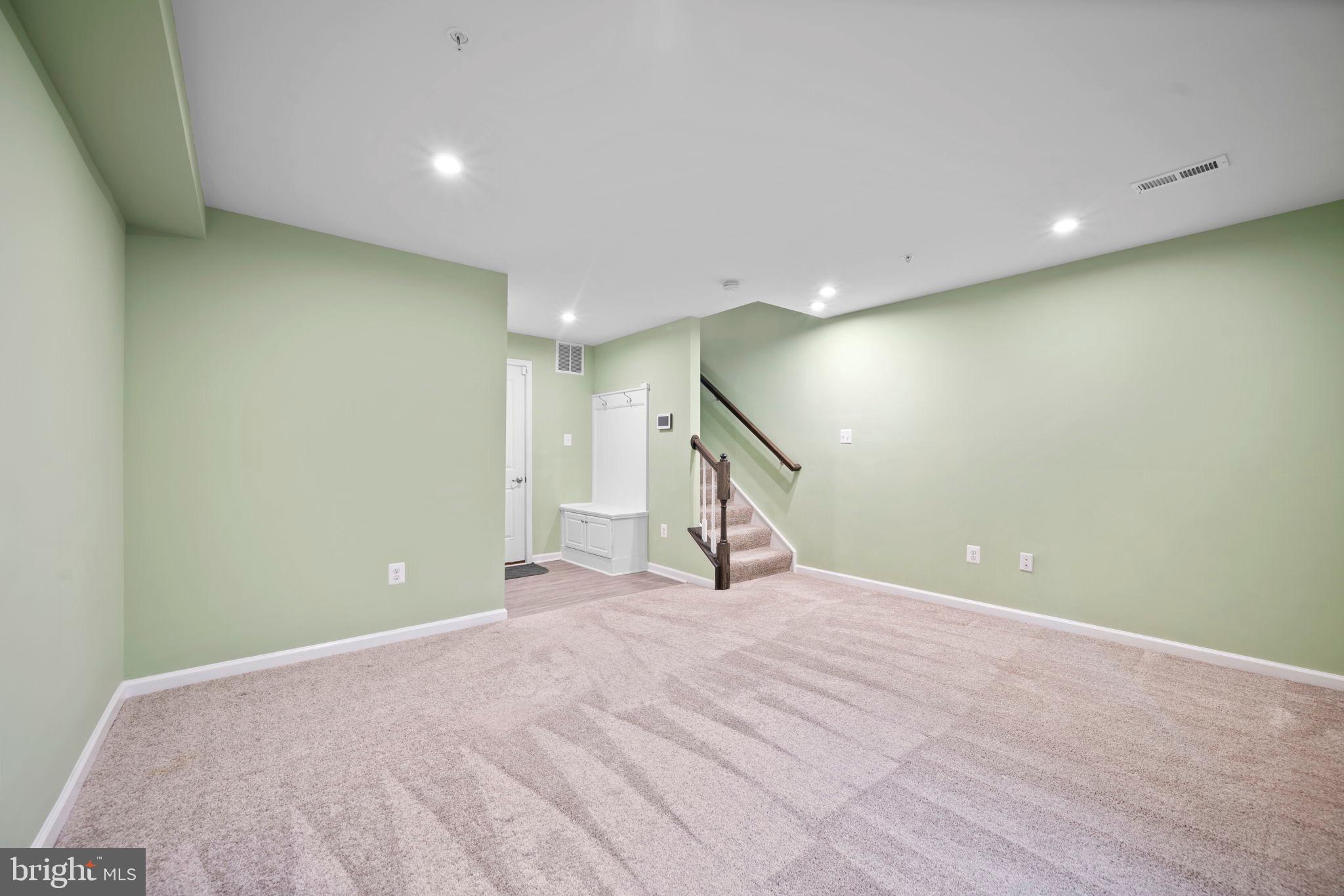 3769 Cedar Mountain Way Hanover, MD 21076 - Photo 21 of 52 a view of an empty room with stairs