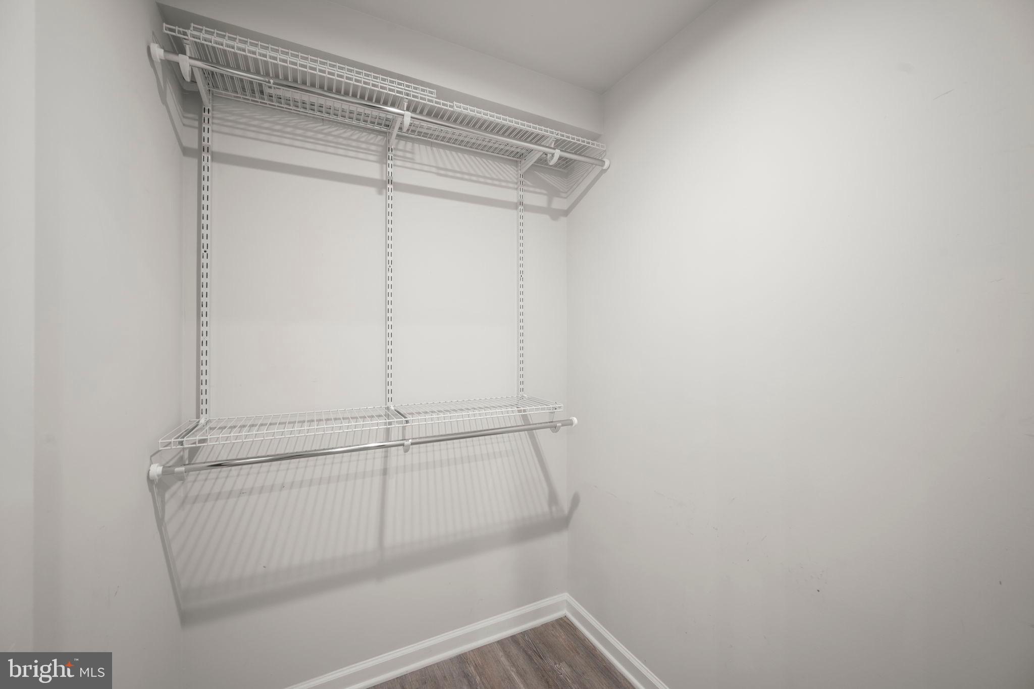 3769 Cedar Mountain Way Hanover, MD 21076 - Photo 22 of 52 a view of a room with racks on the wall