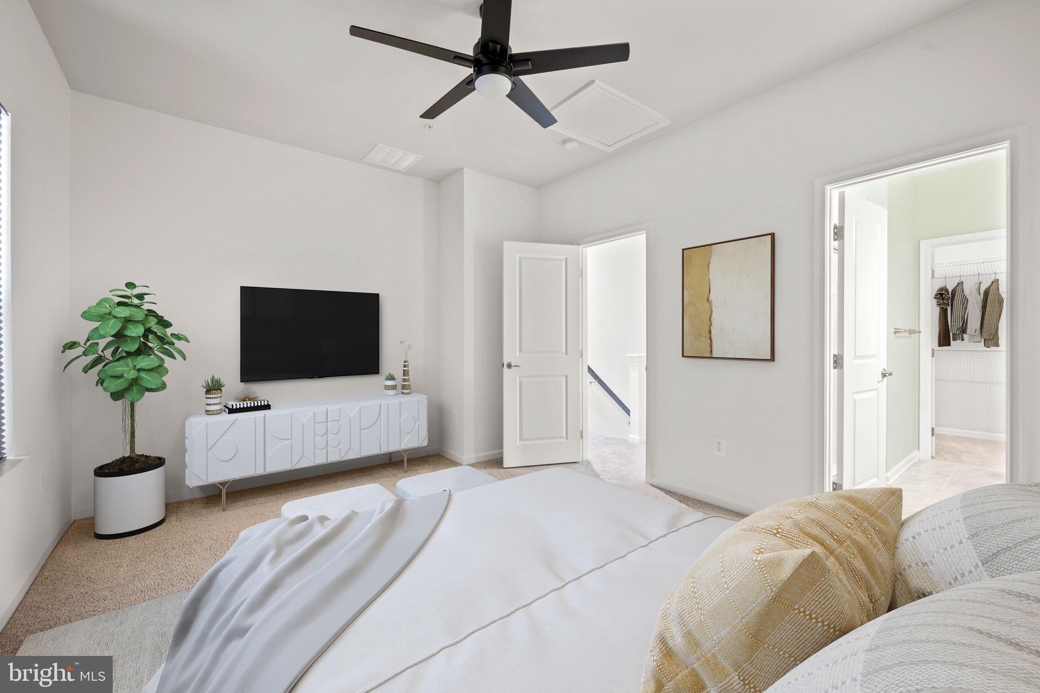 3769 Cedar Mountain Way Hanover, MD 21076 - Photo 24 of 52 a bedroom with a bed and a couch