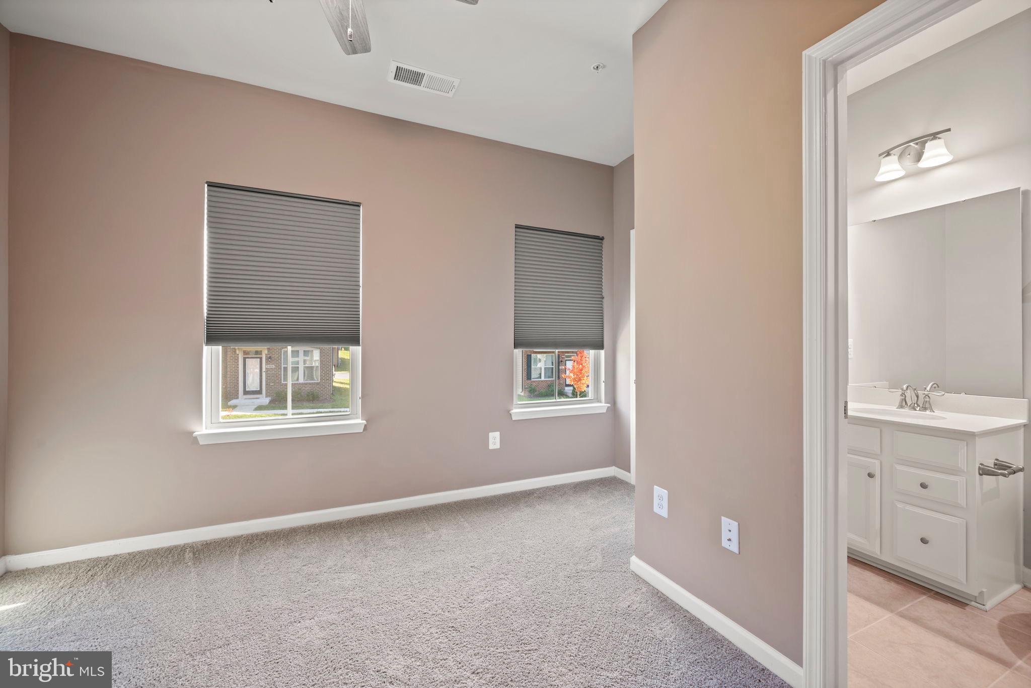 3769 Cedar Mountain Way Hanover, MD 21076 - Photo 32 of 52 a view of an empty room with a window