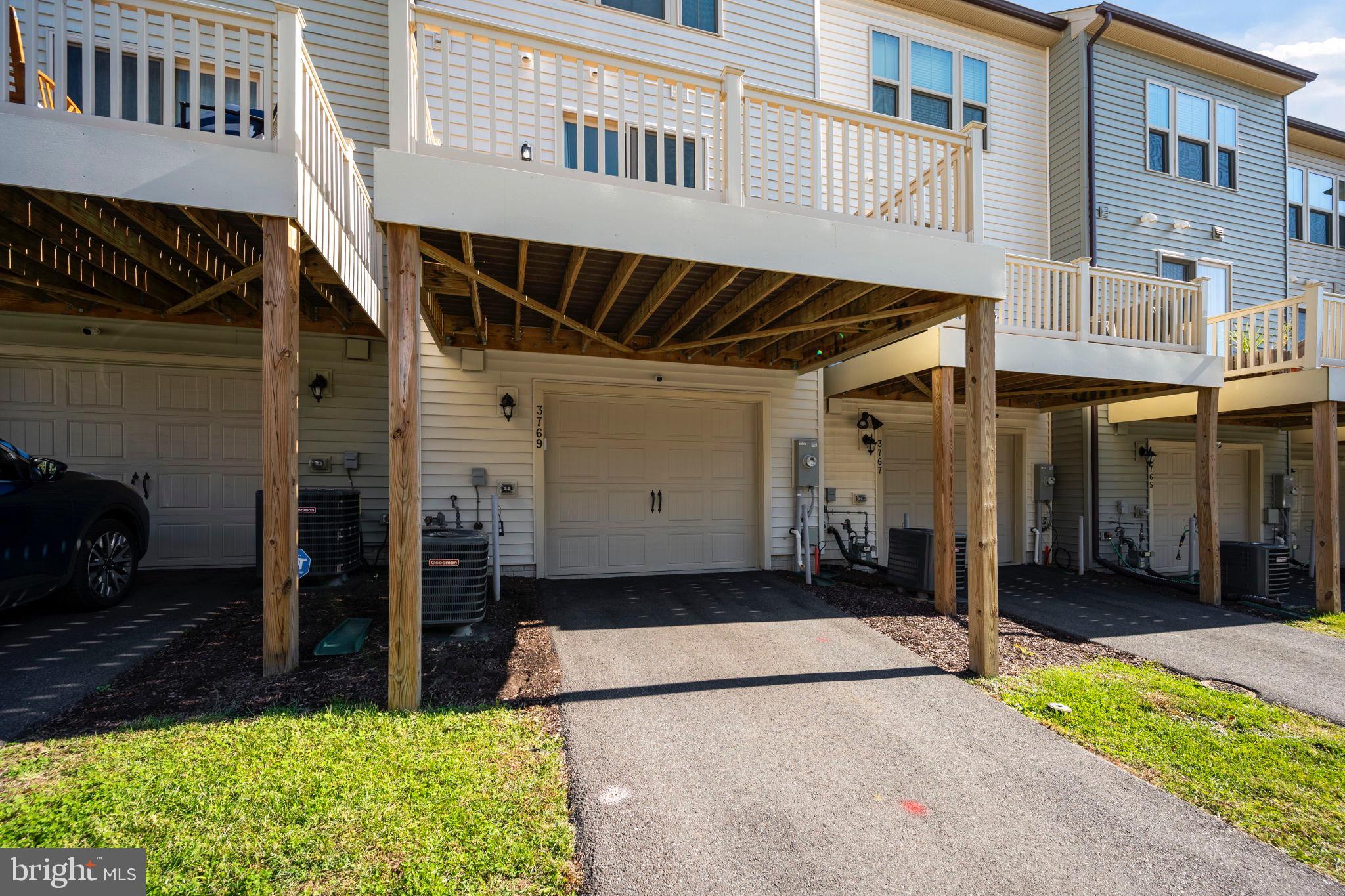 3769 Cedar Mountain Way Hanover, MD 21076 - Photo 41 of 52 a view of a house with a backyard