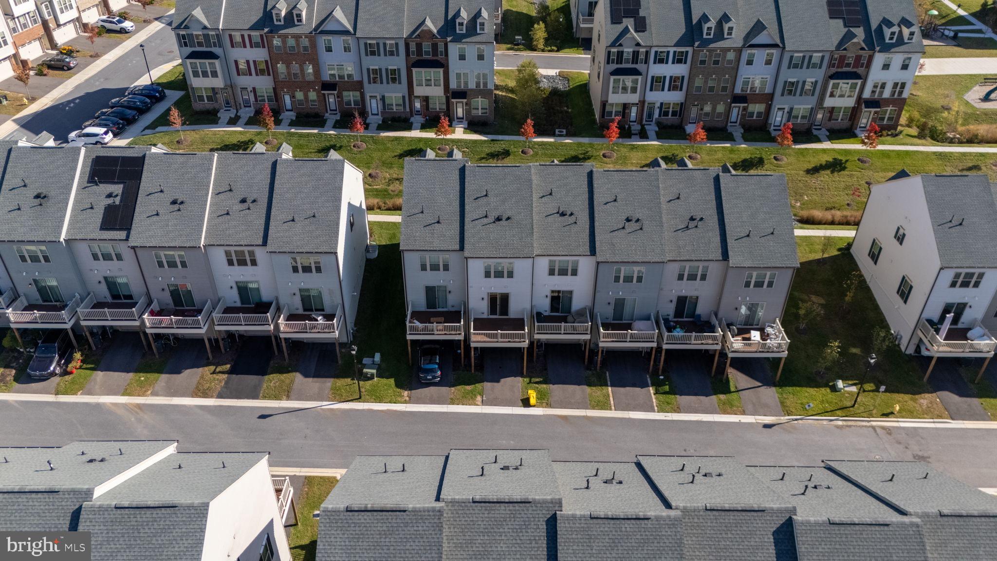 3769 Cedar Mountain Way Hanover, MD 21076 - Photo 45 of 52 a view of a building with a swimming pool