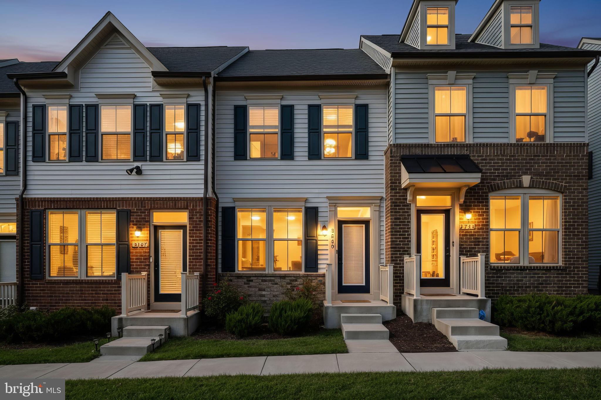 3769 Cedar Mountain Way Hanover, MD 21076 - Photo 46 of 52 a front view of a house with a yard