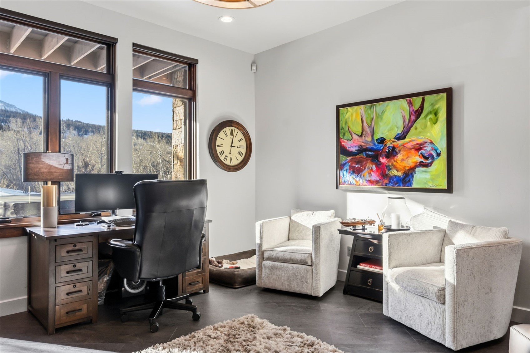 240 Game Trail Road Silverthorne, CO 80498 - Photo 17 of 49 a view of a workspace with furniture and a window