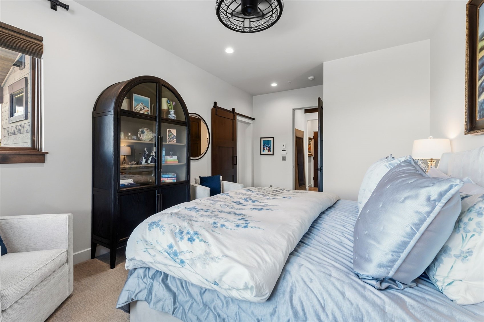 240 Game Trail Road Silverthorne, CO 80498 - Photo 23 of 49 a bedroom with a bed and a dresser