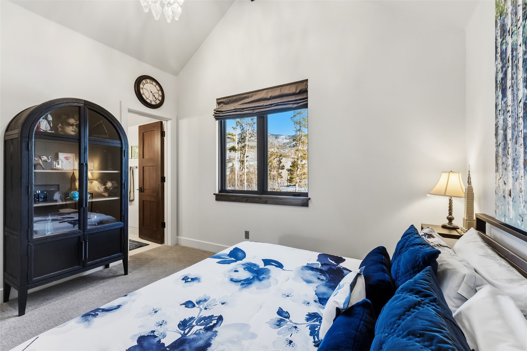 240 Game Trail Road Silverthorne, CO 80498 - Photo 33 of 49 a bedroom with a bed and a window